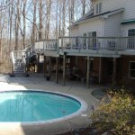 3,000 Sq. foot composite pool deck with stairs and under decks.